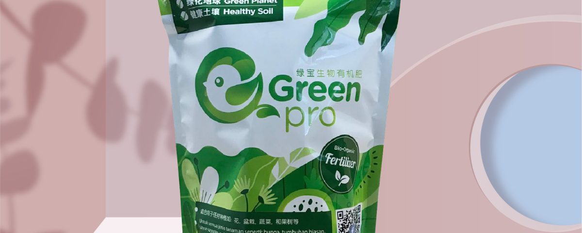A stand-up pouch of Green Pro fertilizer displayed on a circular platform.