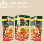 Three identical pouches of Sarawak Laksa Paste arranged side-by-side against a light background.