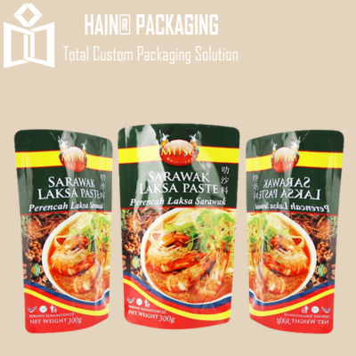 Three identical pouches of Sarawak Laksa Paste arranged side-by-side against a light background.