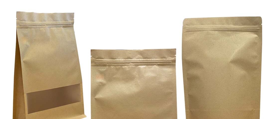Three brown craft paper bags with windows, displayed against a white background.