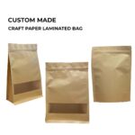 Three brown craft paper bags with windows, displayed against a white background.