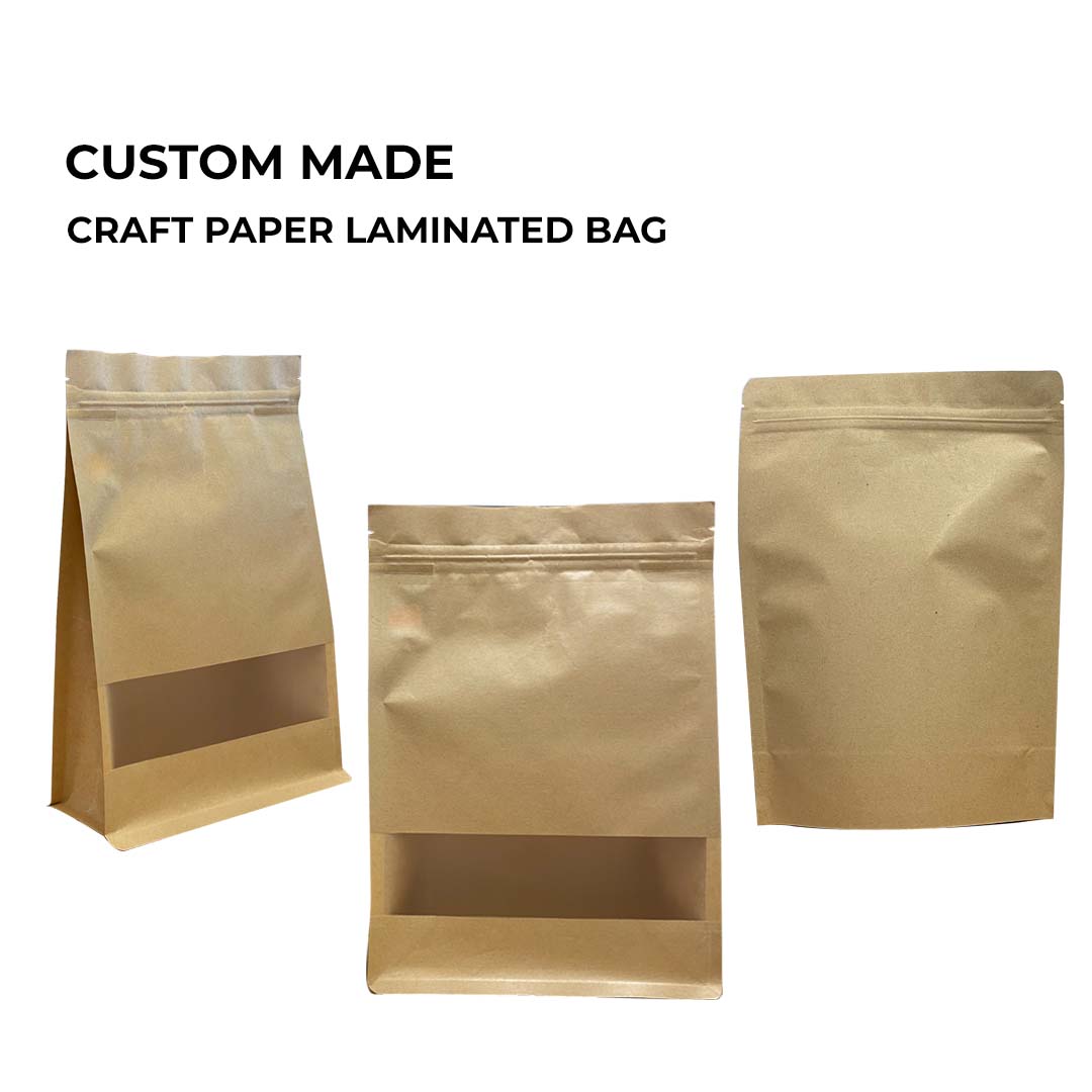 Three brown craft paper bags with windows, displayed against a white background.