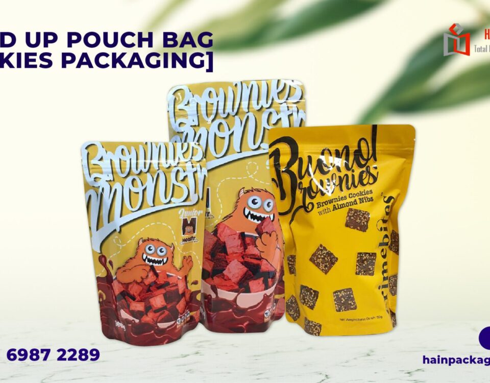 Three yellow stand-up pouches labeled Brownies and Bueno Brownies with cartoon monster graphics.