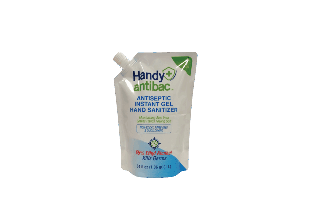 A white flexible plastic pouch of Handy Antibac antiseptic instant gel hand sanitizer against a black background.